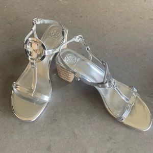 Tory Burch silver leather sandals with mirror finish.